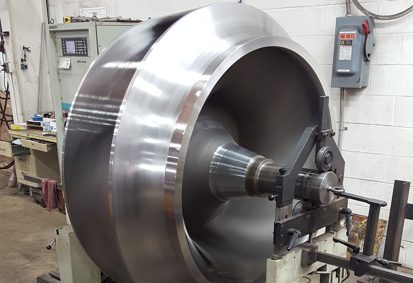 Precision balancing of a large industrial pump impeller at Cleveland Pump Repair’s Ohio facility.