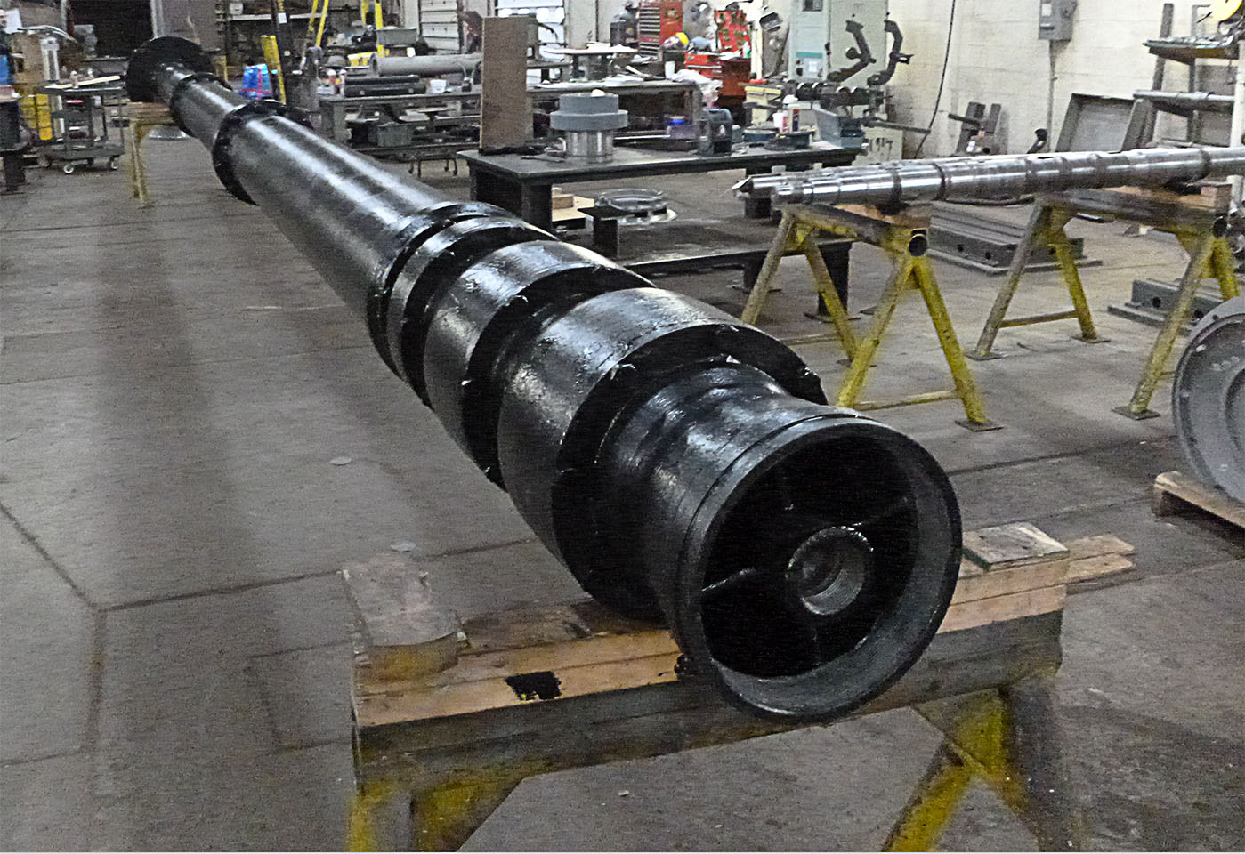 Assembled vertical turbine pump undergoing shaft and impeller repair at Cleveland Pump Repair’s shop.